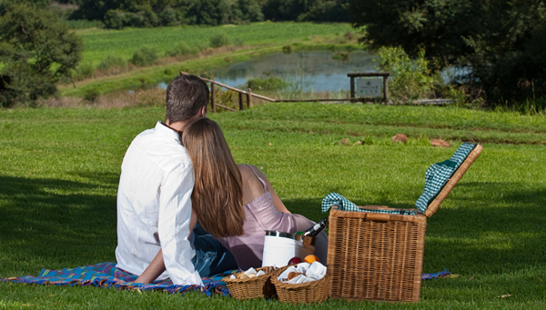 A couple enjoying a picnic at Budmarsh Country Lodge. Photo supplied.