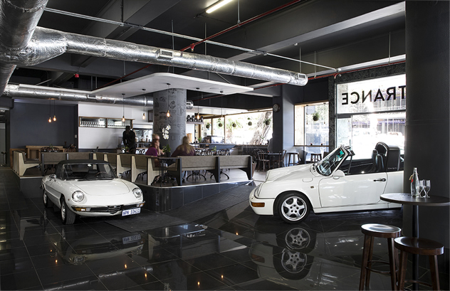 Sports cars adorn the interior at Dapper Coffee. Photo courtesy of the restaurant.