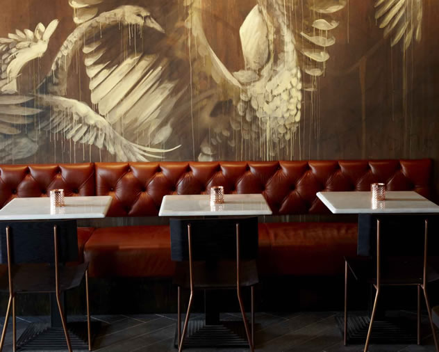 Comfortable bench seating at Charango. Photo courtesy of the restaurant.