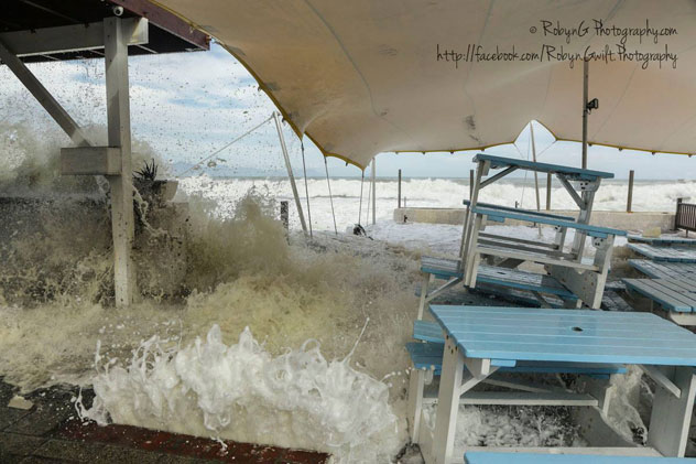 Waves crash through the restaurant's outdoor deck area. Photo courtesy of Robyn Gwilt.