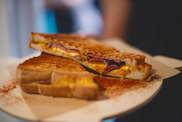 A toasted sandwiche from Bacon on Bree. Photo courtesy of Claire Gunn Photography.