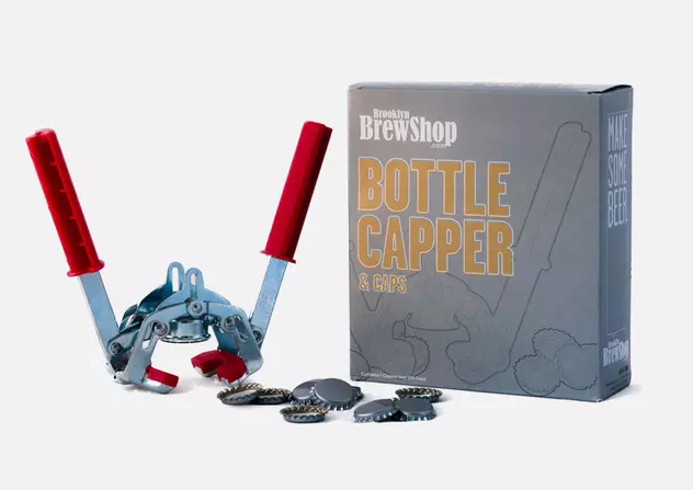 A bottle capper and caps.