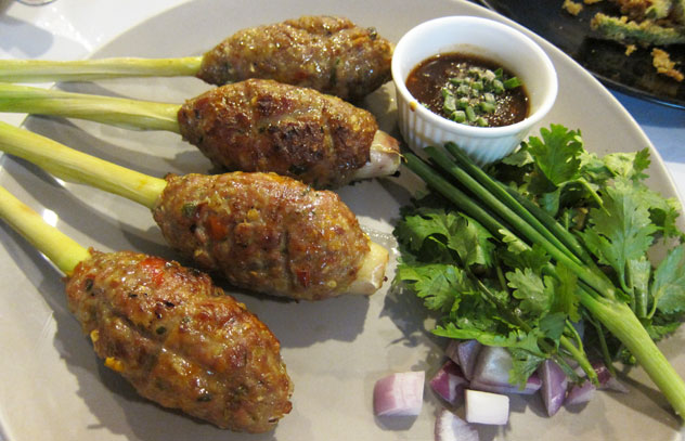 Pork kebabs on lemongrass sticks at Steve's Restaurant in Bangkok.