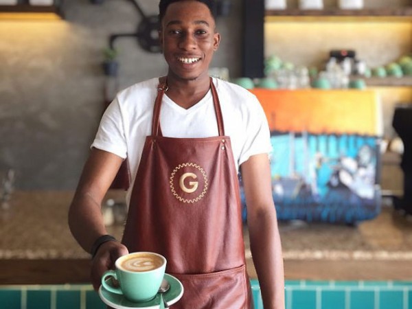 One of The Grind baristas, Alfred. Photo courtesy of the cafe.