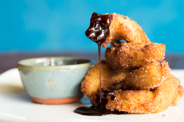 Decadent churros with chocolate sauce. Photo by Rupesh Kassen.