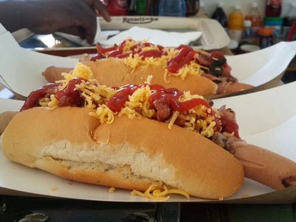 A gourmet dog topped with cheese at Stuff Café. Photo supplied.