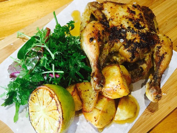 A baby lemon and herb chicken at Gastao's. Photo supplied.