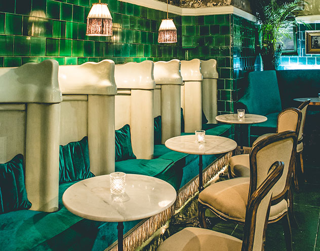 Beautiful emerald booths make for a more intimate seating option. Photo supplied.