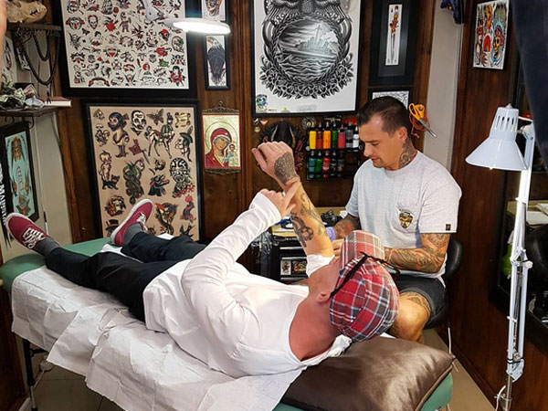 Three Capetonians get doughnut tattoos for Dunkin’ Donuts launch