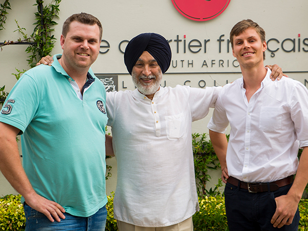 Chef Scot Kirton, with Analjit Singh and chef James Gaag. Photo supplied.