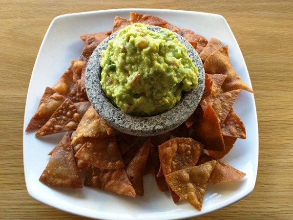 The creamy guac and nachos at Fuego. Photo by Katharine Jacobs.