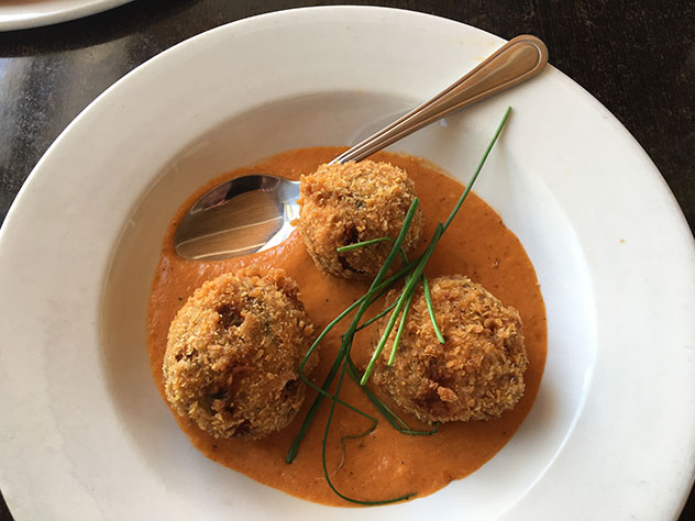 The croquettes come in a delicious sauce. Photo by Jaco Voges.