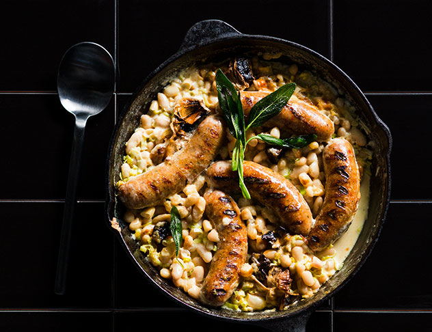 Pork sausages in creamy beans. Photo by Michael Le Grange.
