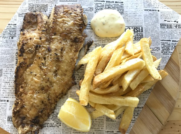 Grilled hake with chips and tartar sauce at Deep Blue Fish Co. Photo supplied.