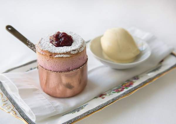 Try not to take dozens of pictures of Orangerie's raspberry souffle