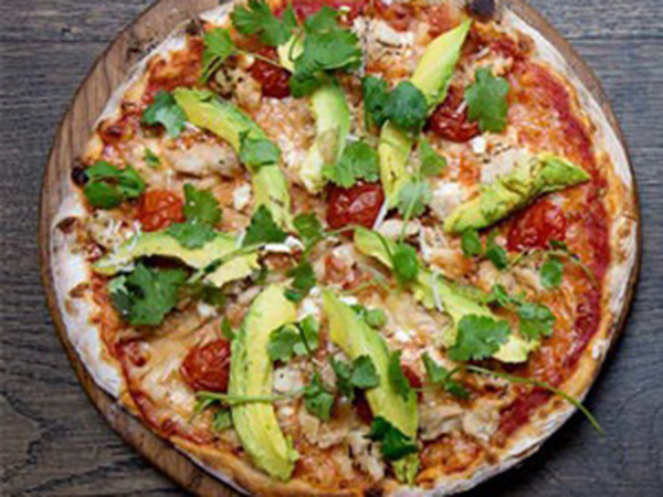 A pizza to go with your happy hour specials at Piza e Vino.