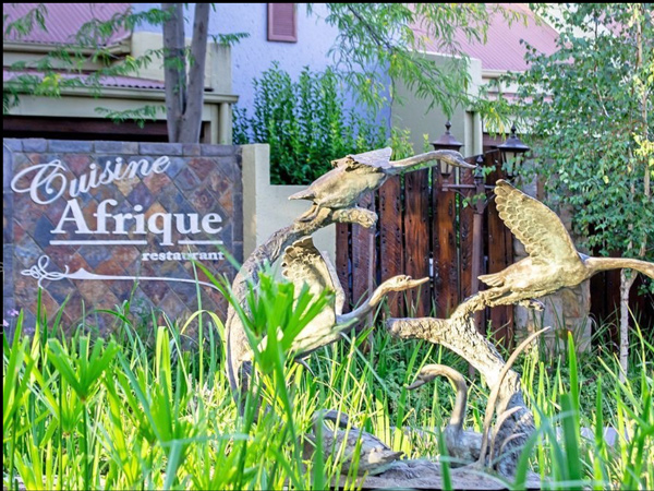 Outside at Cuisine Afrique - Featured Image