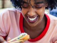 girl eating sushi